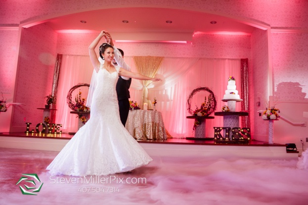 pink uplighting rustic wedding reception