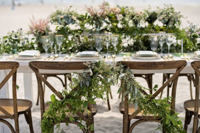 elegant seaside inspired shoot greenery dressed french country chairs