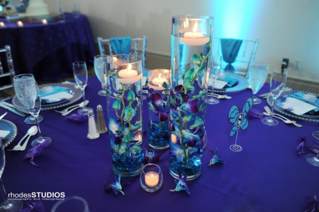 Rhodes Studios, A Chair Affair, reception table center in purple and blue, orlando weddings
