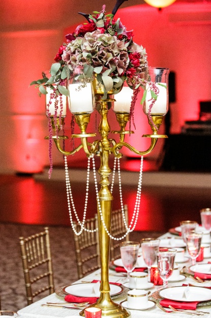 Lake-Mary-Events-Center-Nancy-Faircloth-Photography-Filigree-Chargers-Gold-Flatware-Gold-Rim-Stemware-Gold-Candelabras-Floral-Bowl-A-Chair-Affair-Event