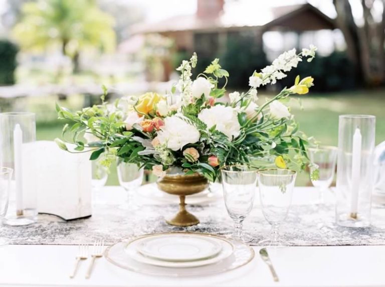 sophisticated yellow pale blue wedding inspiration gold rimmed charger, flatware and stemware