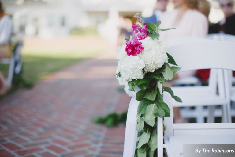 southern elegance wedding white folding chair floral