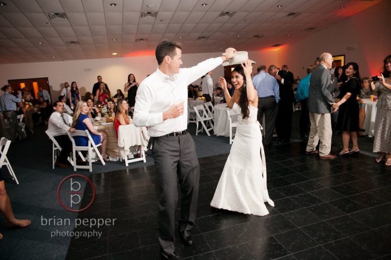 trinity lutheran downtown weddings white resin chairs - black dance floor