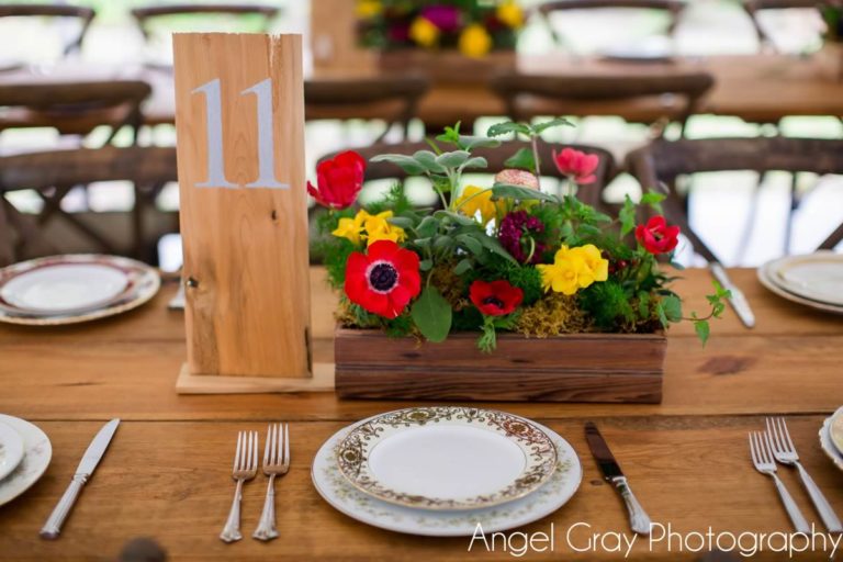 vibrant spring wedding mixed matched china floral centerpiece