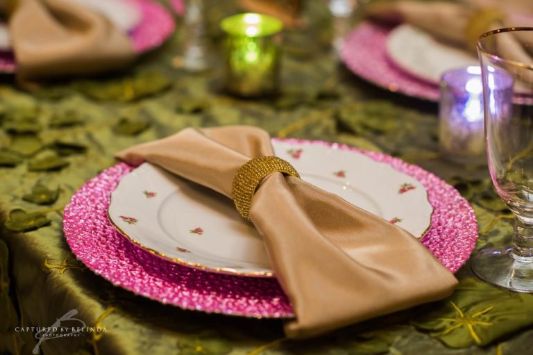 wedding reception design pink charger green linens