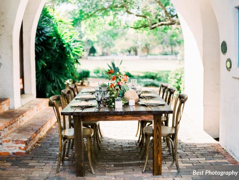 romantic spanish editorial farm table and french country chairs