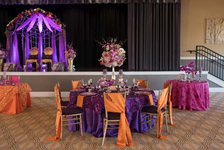 purple and gold indian themed styled shoot gold chiavari chairs reception