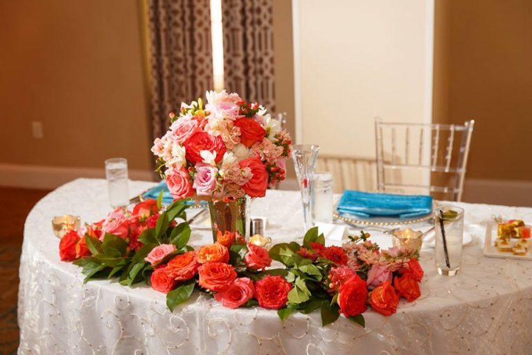 colorful wedding on the beach, sweetheart table