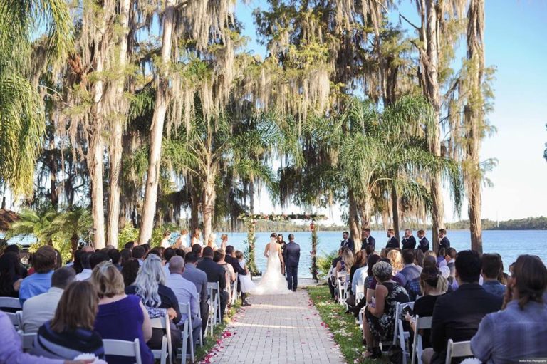 Paradise Cove Orlando Wedding A Chair Affair ceremony white folding chair