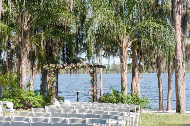 Paradise Cove Orlando Wedding A Chair Affair white folding chairs