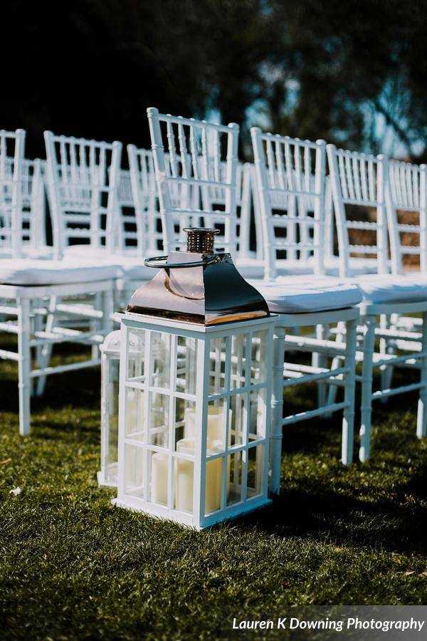 Bella Collina Wedding A Chair Affair white folding chairs 1