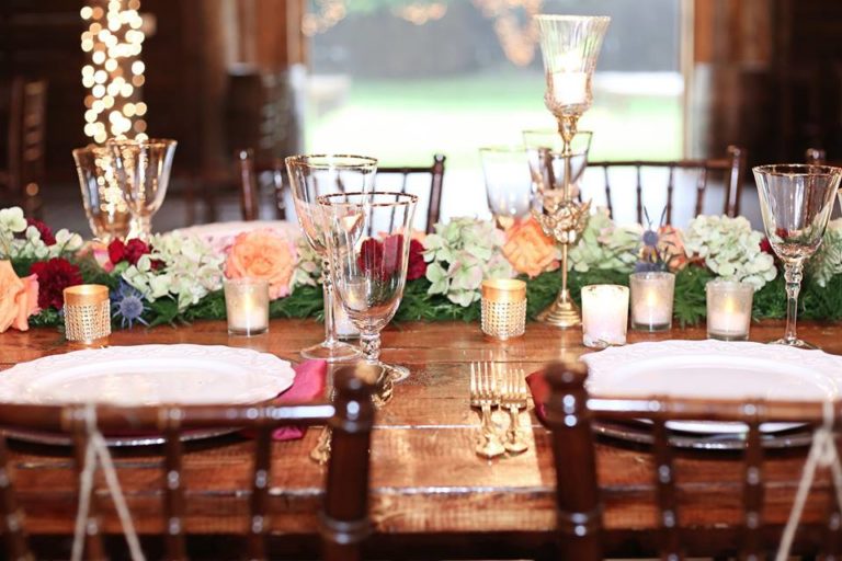 Enchanting Barn Wedding Inspiration A Chair Affair chiavari chair farm table gold stemware gold flatware