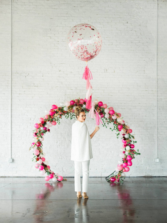 Fashionable Bridal Shower at Haus 820 A Chair Affair Posing with Balloons