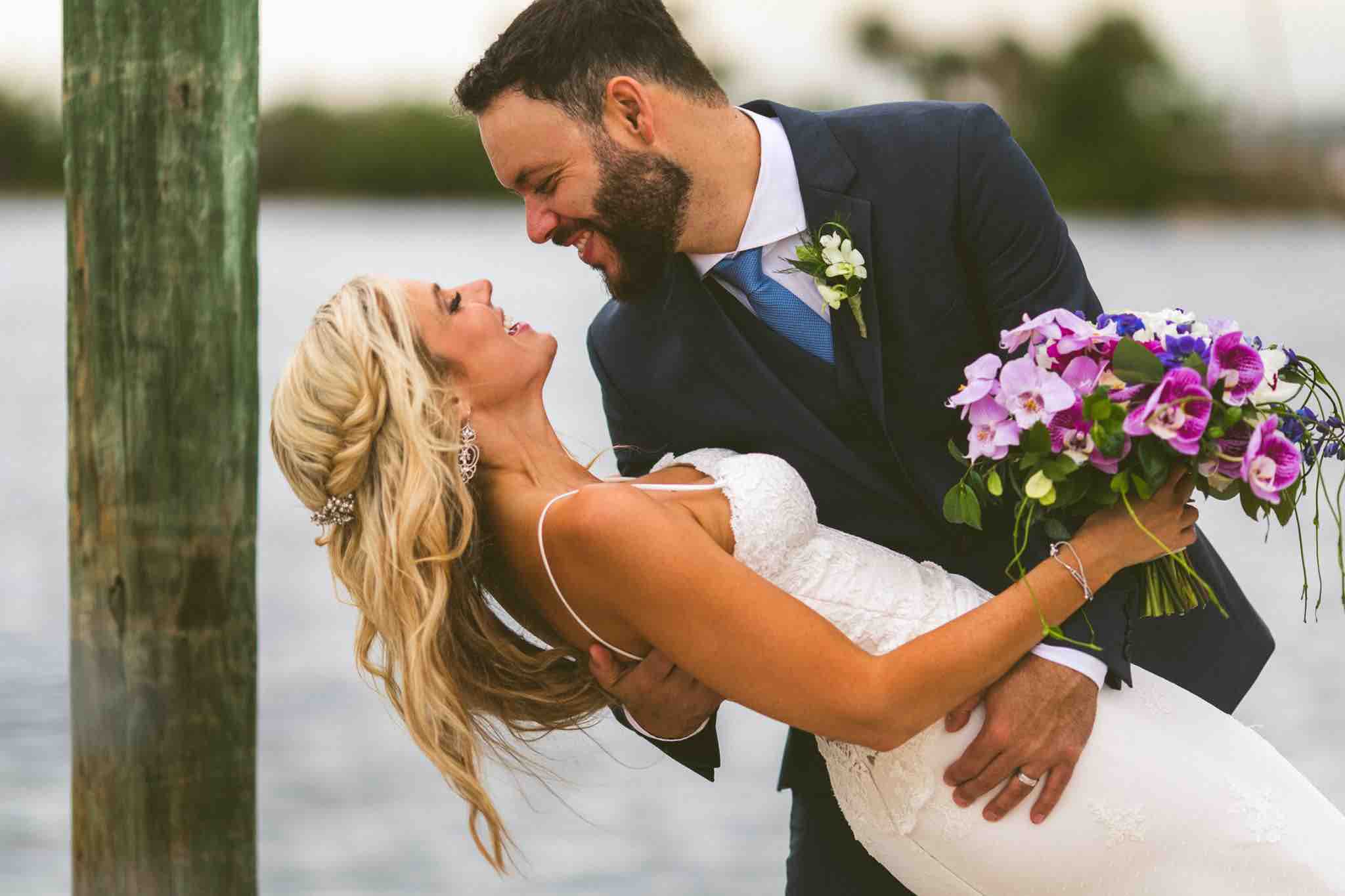 Waterfront Wedding at Eau Gallie Yacht Club A Chair Affair Newlyweds