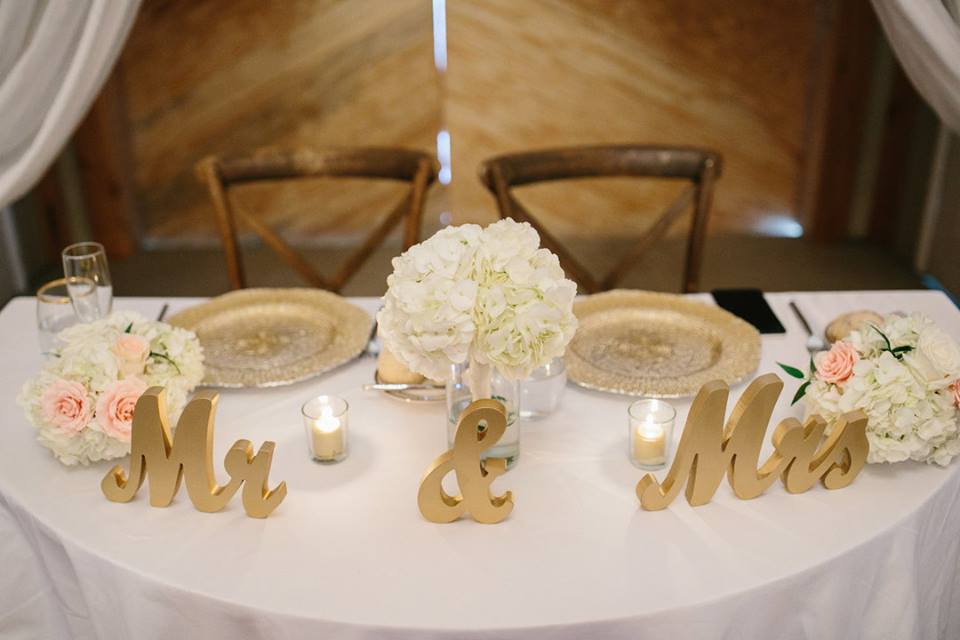 October Oaks Farm Wedding A Chair Affair mahogany french country chairs gold octo chargers 2