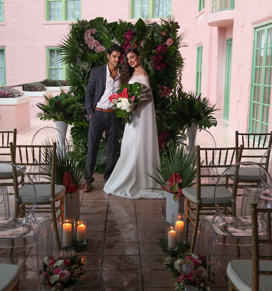 Vinoy Renaissance Wedding A Chair Affair Couple with Gold Chiavari Chairs