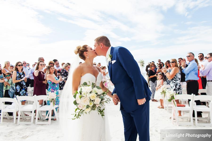 Hilton Clearwater Beach Wedding A Chair Affair Couple with White Folding Chairs