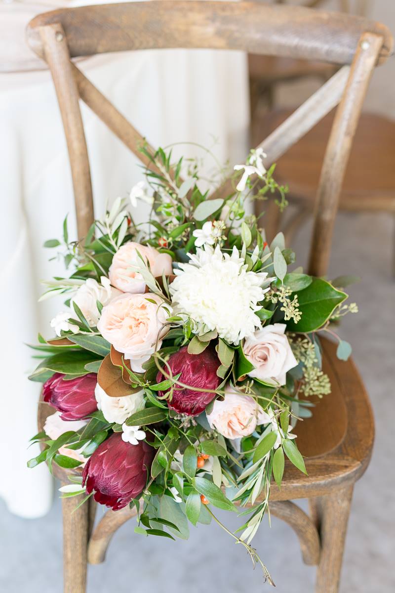 vintage-inspired farm wedding A Chair Affair French country chair with flowers