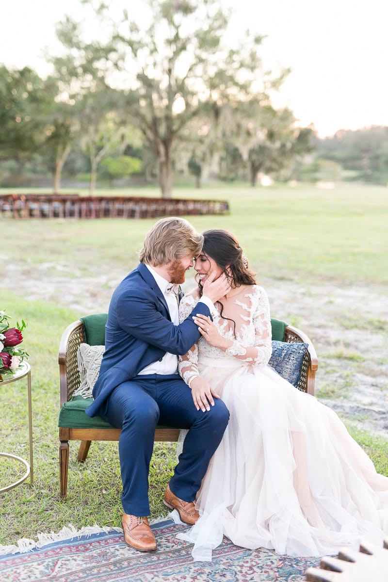 vintage-inspired farm wedding A Chair Affair newlywed couple