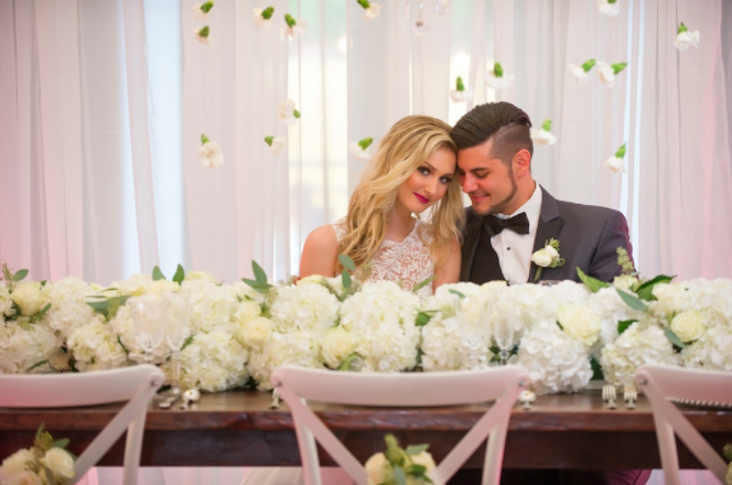 romantic southern-styled shoot A Chair Affair white French country chair with couple