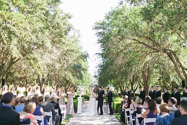 Summer Reunion Resort Wedding A Chair Affair Christina and Kel at Ceremony White Folding Chairs