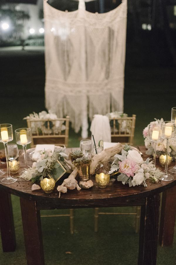 boho chic beach wedding A Chair Affair gold chiavari chairs and sweetheart table