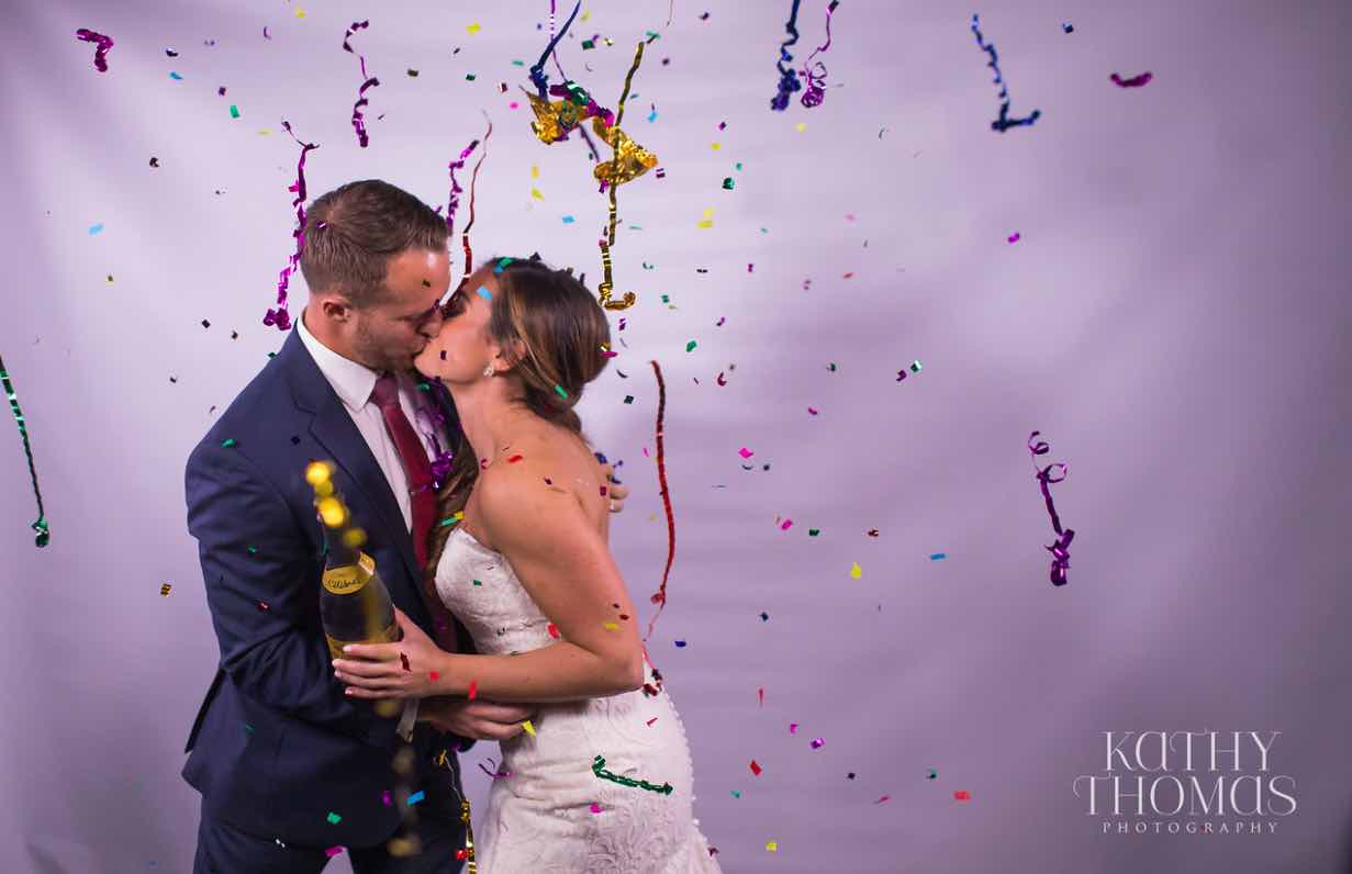 Alexa and Derek luxury Ritz Carlton wedding A Chair Affair couple confetti