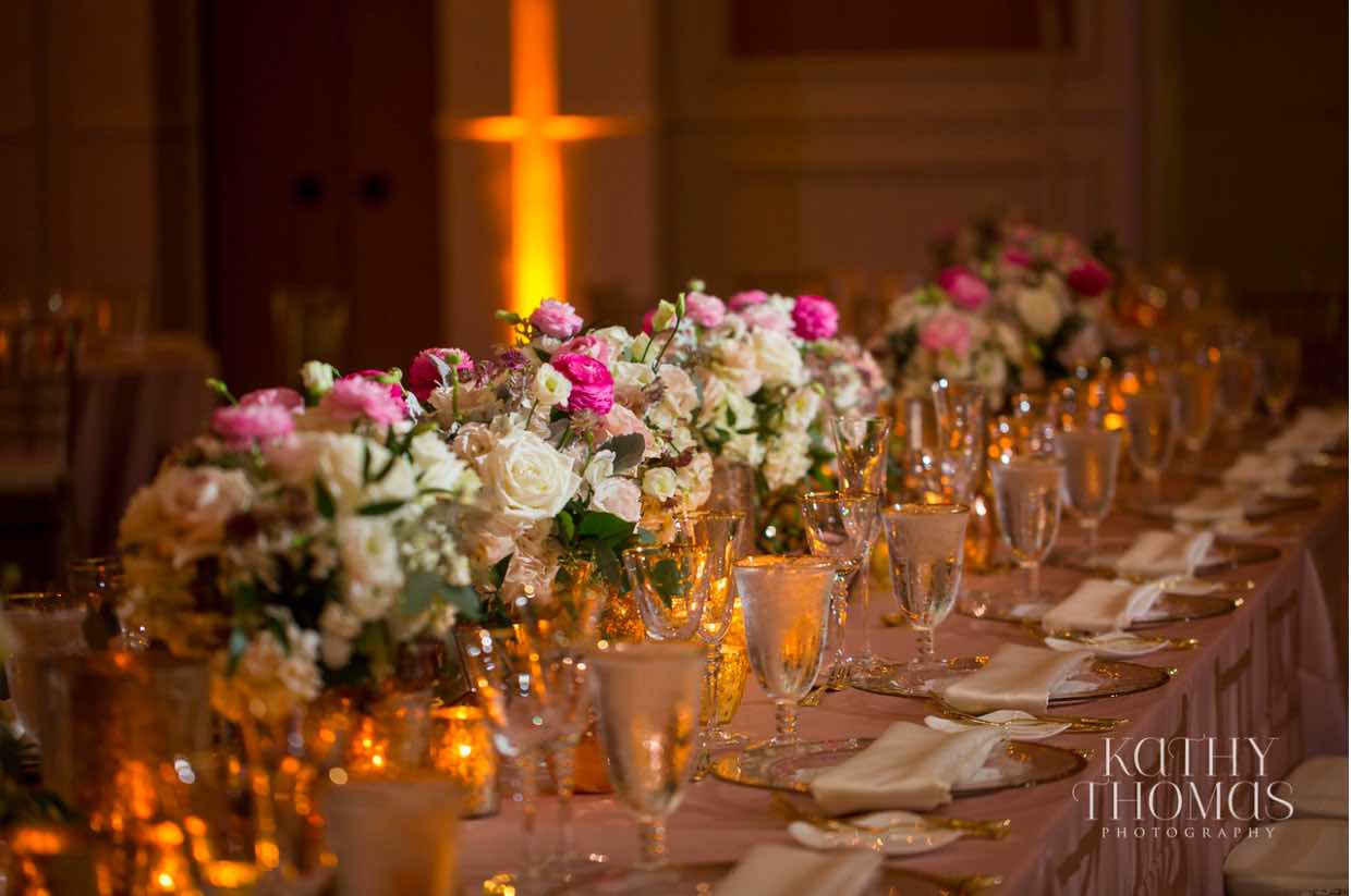 Alexa and Derek luxury Ritz Carlton wedding A Chair Affair gold rim stemware ballroom