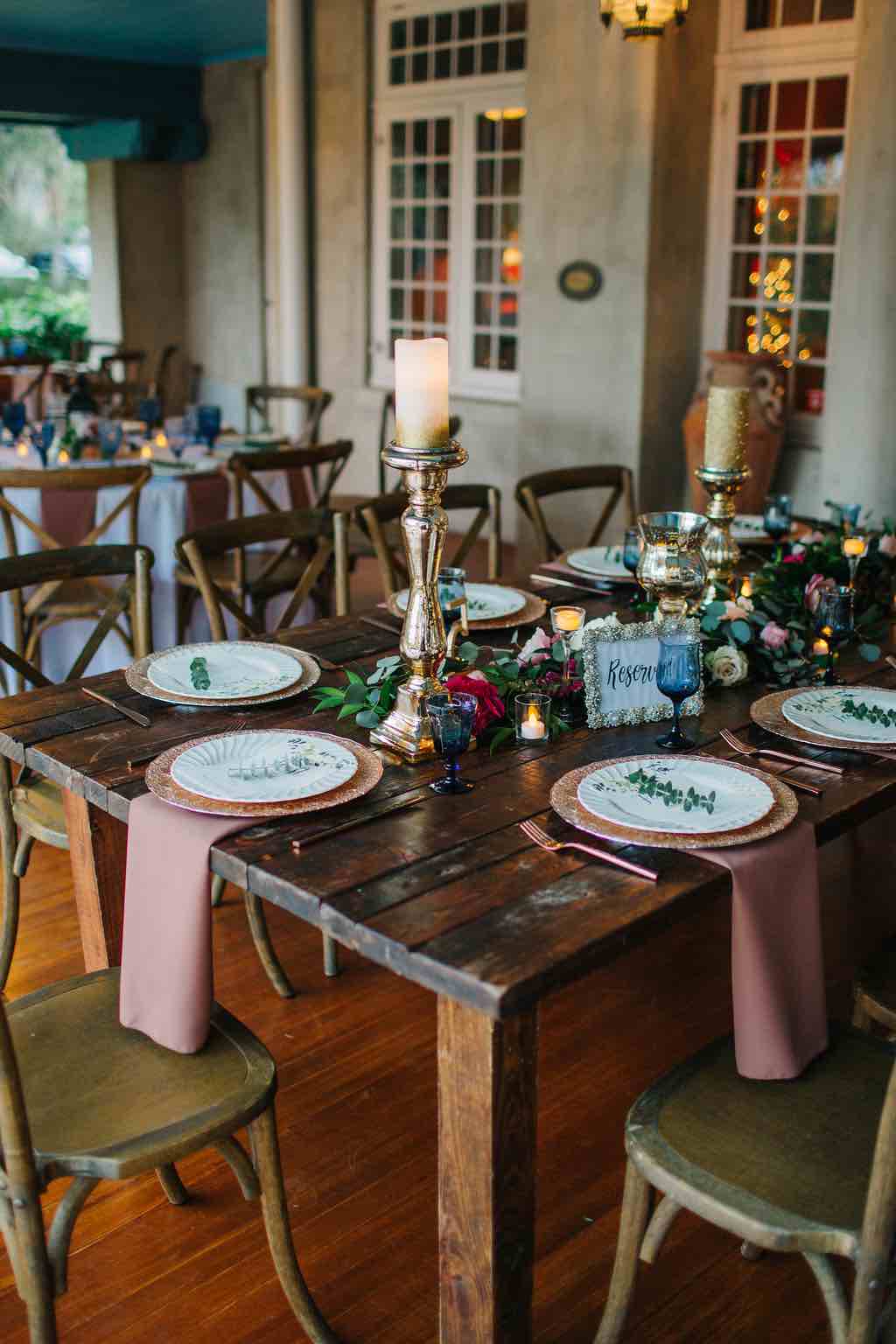 romantic Sydonie Mansion wedding Shelbie and Justin Reception French Country Chairs Farm Table Napkins and Rose Gold Chargers A Chair Affair