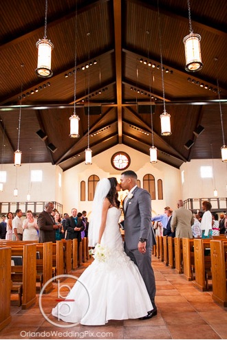 Alyssa and Claudel Lake Mary Wedding A Chair Affair Couple Ceremony All Souls Catholic Church