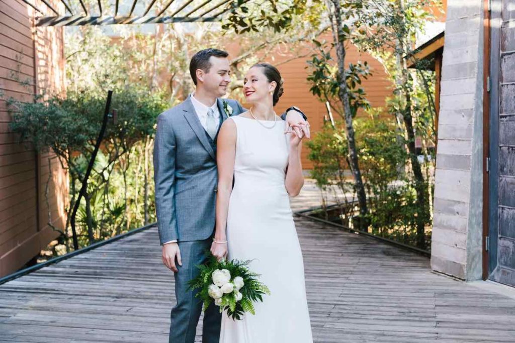 Atlantic Center for the Arts wedding Moonstone Studios A Chair Affair Margo and Lee Bride and Groom Smiling