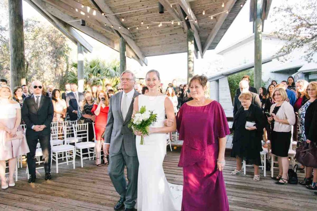 Atlantic Center for the Arts wedding Moonstone Studios A Chair Affair White Chiavari Chairs with white Chiavari pads at ceremony