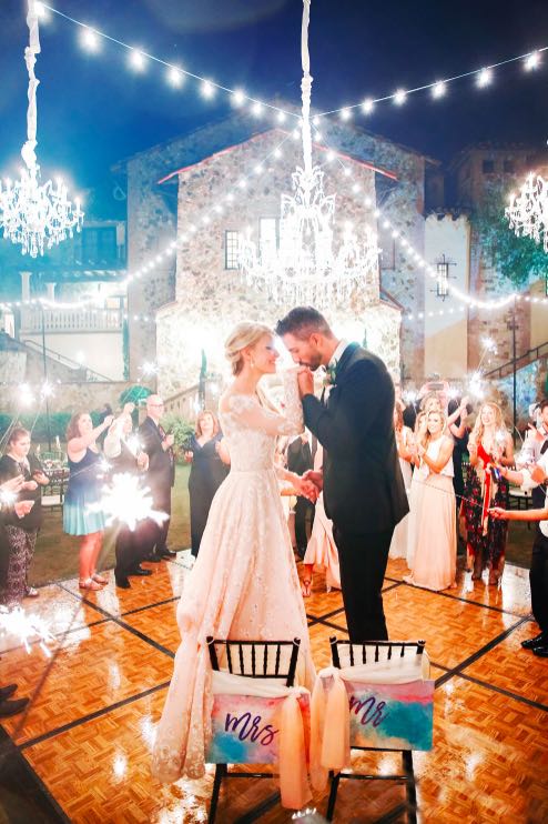 Fairytale Florida Wedding A Chair Affair Black Chiavari Chairs Bella Collina couple at golden hour Lindsay and Jarrus