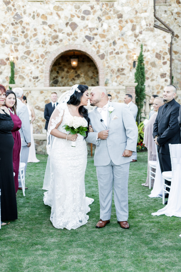 Bella Collina Beautiful Blush and Grey Wedding A Chair Affair Bride and Groom