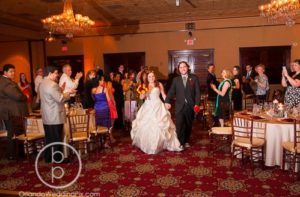 downtown Orlando wedding red and gold Heather and Joe Ballroom at Church Street Orlando Wedding Pix A Chair Affair mahogany Chiavari chairs with gold Chiavari pad