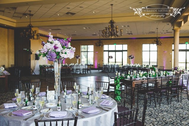 Bella Collina Wedding Reception A Chair Affair Silver Belmont Chargers and Mahogany Farm Tables William Arthur Photography