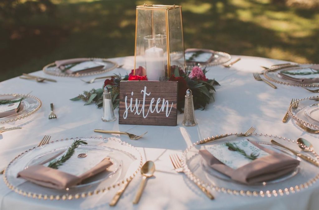 Intimate Garden Wedding at Davis Island Garden A Chair Affair Reception Gold Belmont Chargers and Gold Flatware