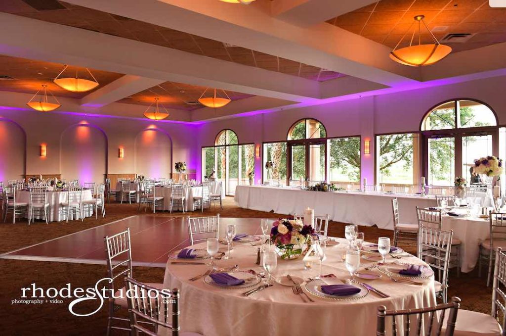 Purple and Silver wedding at Omni Resort A Chair Affair silver Chiavari chairs and silver belmont chargers at reception with amethyst napkins