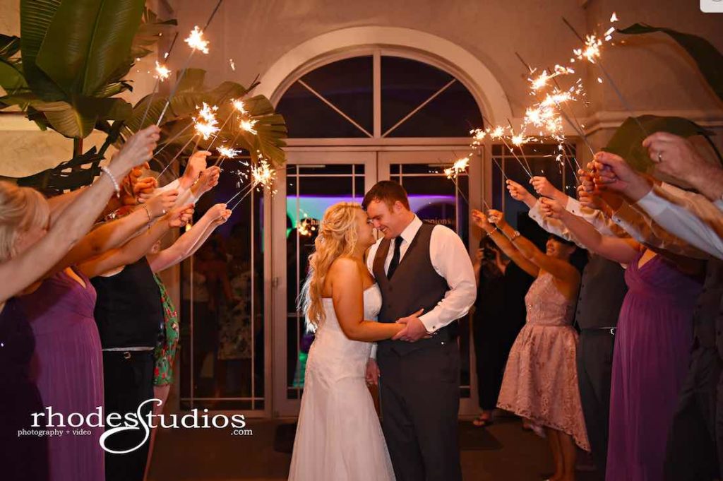 Purple and Silver wedding at Omni Resort Couple sparkler sendoff