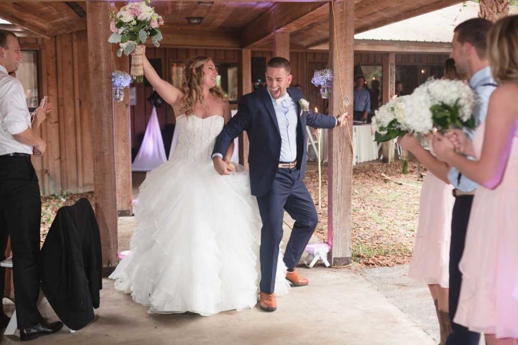 hammock house a chair affair bride and groom exit