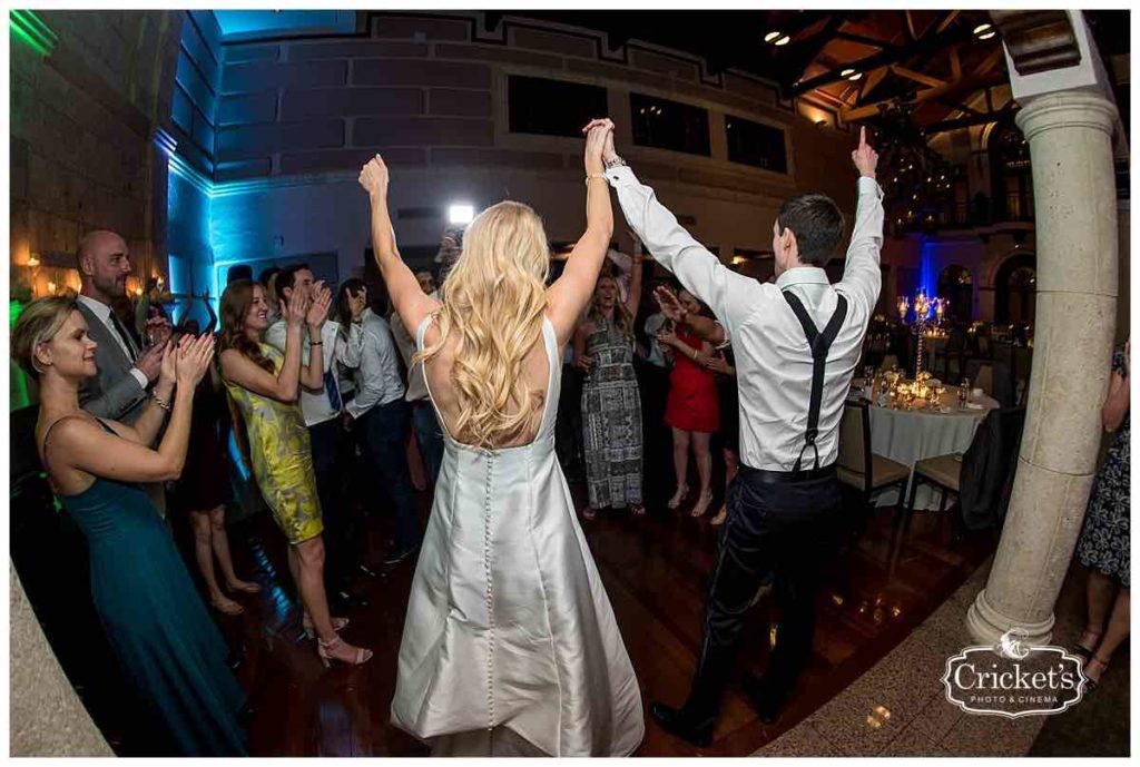 Isleworth Country Club Wedding Classic White Wedding Crickets Photo A Chair Affair Couple Raised Hands