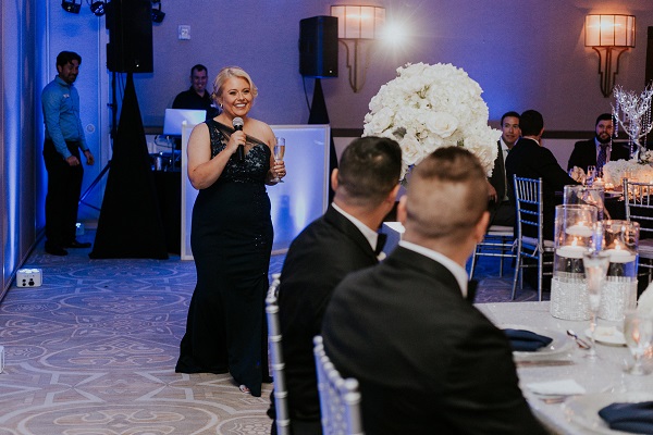 Alfond-Inn-Wedding-A-Chair-Affair-LGBT-Wedding-Navy-Linens-Silver-Glittler-Chargers