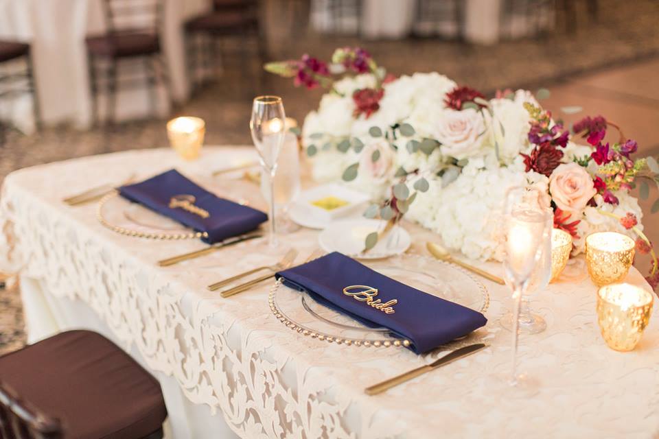 Gold Bella Collina Wedding A Chair Affair belmont chargers brushed gold flatware