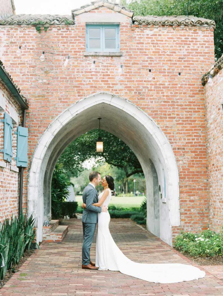 Bride and Groom Under Arch