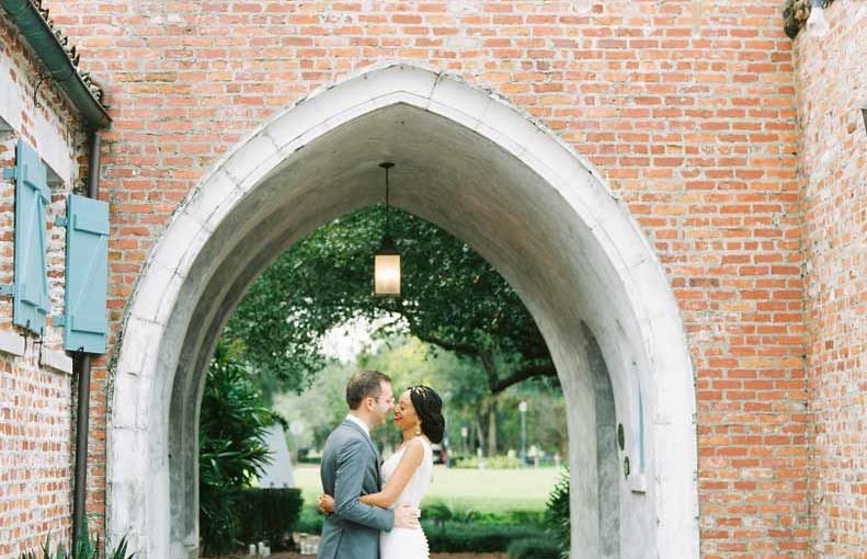 Bride and Groom Under Arch