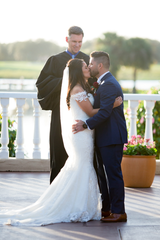 Bride and Groom First Kiss at Mission Inn Wedding