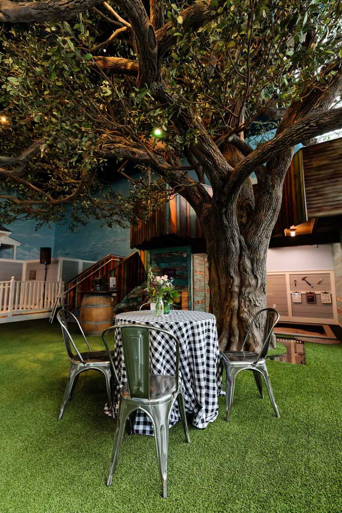 Round Table and Tolix Chairs under Tree