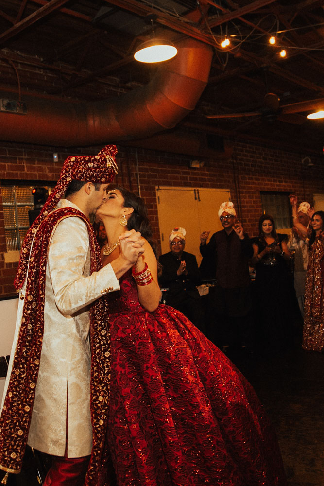 Bride and Groom Kiss at Reception