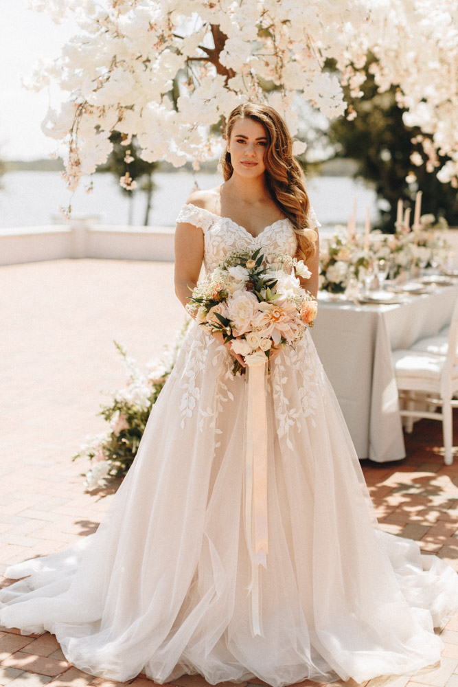 bride holding bouquet at Adams Estate