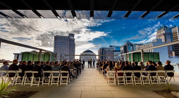 A Chair Affair- Dr. Phillips Center Wedding- Navy and Burgundy LGBT Wedding